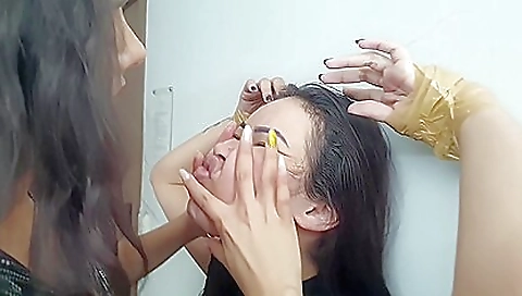 Asian girl with a dildo fucking